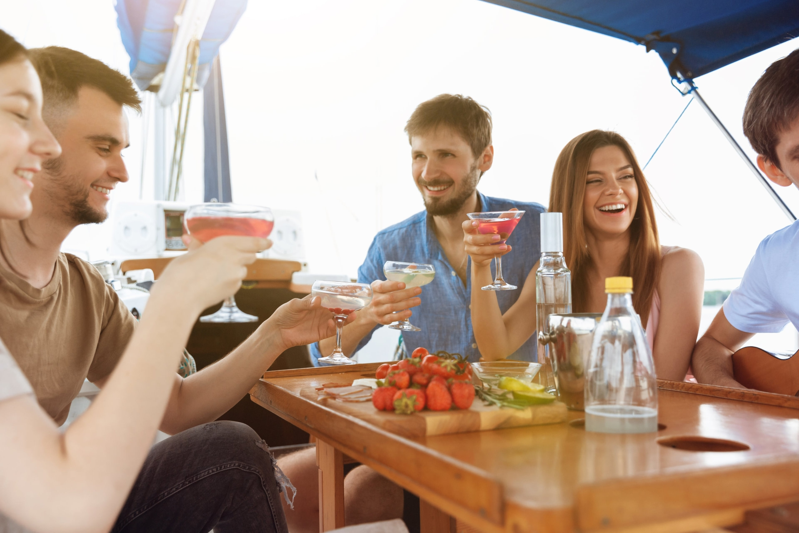 Private Chef on a Yacht, group of friends drinking on a yacht.